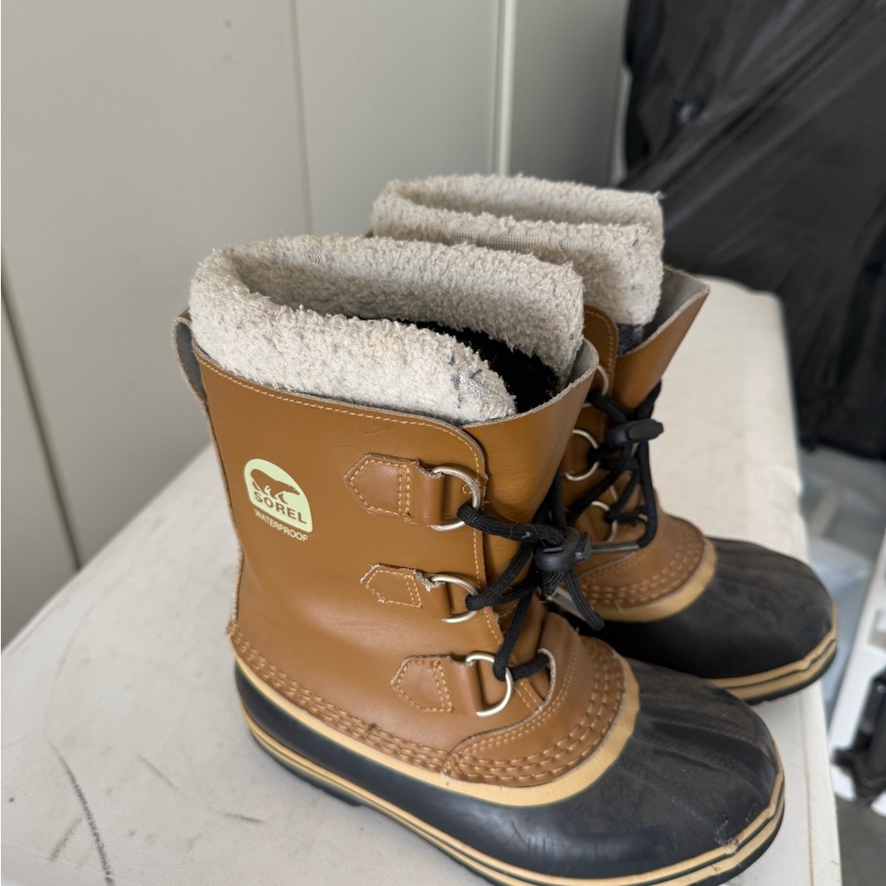 Sorel Tan and Black Insulated Boots
